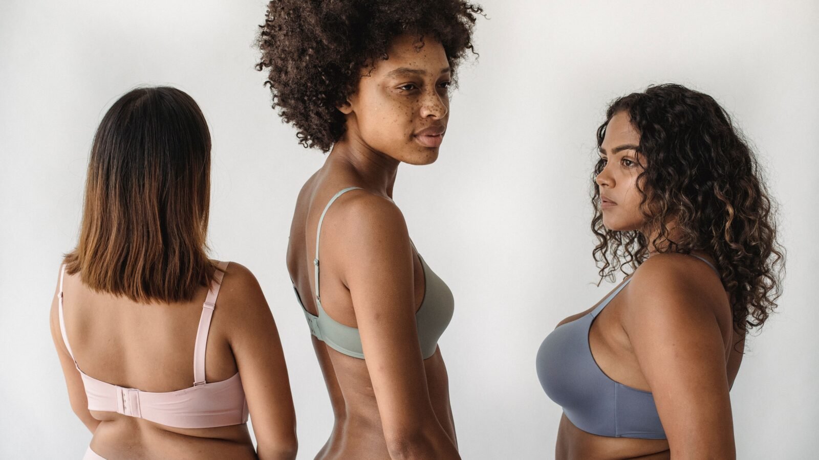 A visual guide showing different skin types on a clean, neutral background, highlighting oily, dry, and combination textures