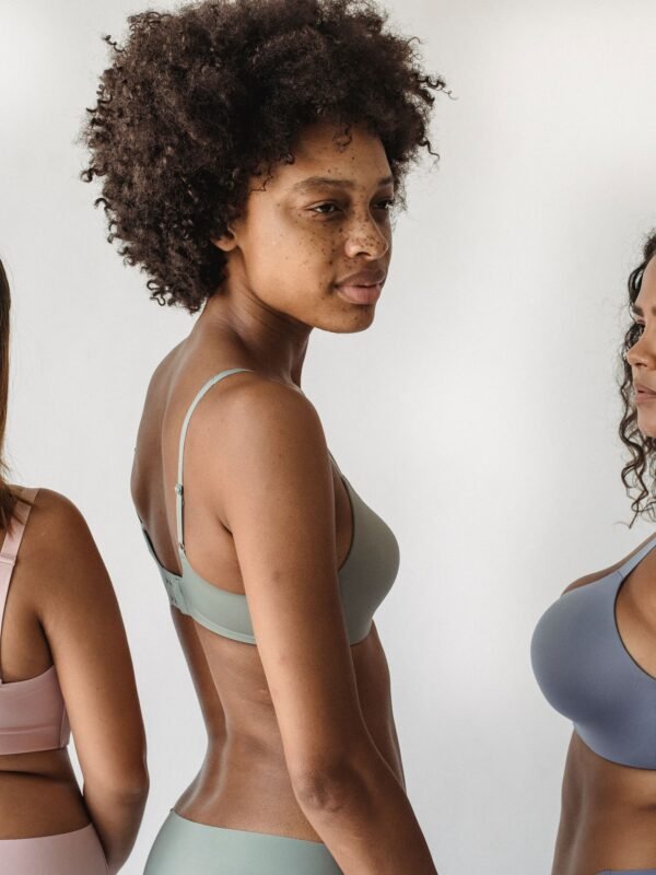 A visual guide showing different skin types on a clean, neutral background, highlighting oily, dry, and combination textures